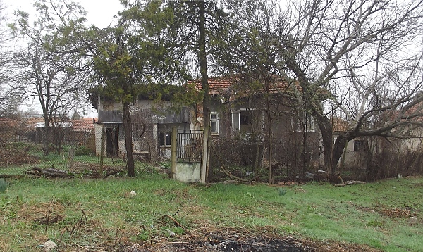 derelict-house-with-annex-garage-and-land-located-within-the-limits-of-a-quiet-village-near-river-hills-and-fields-20-km-north-o